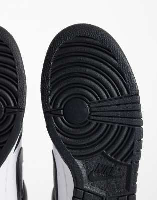 Nike Dunk Low Retro Trainers in Black and White