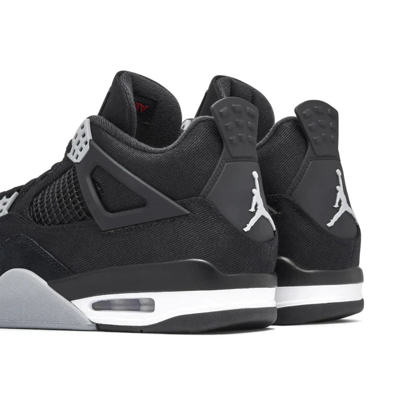 Air Jordan 4 Retro Trainers in Black Canvas