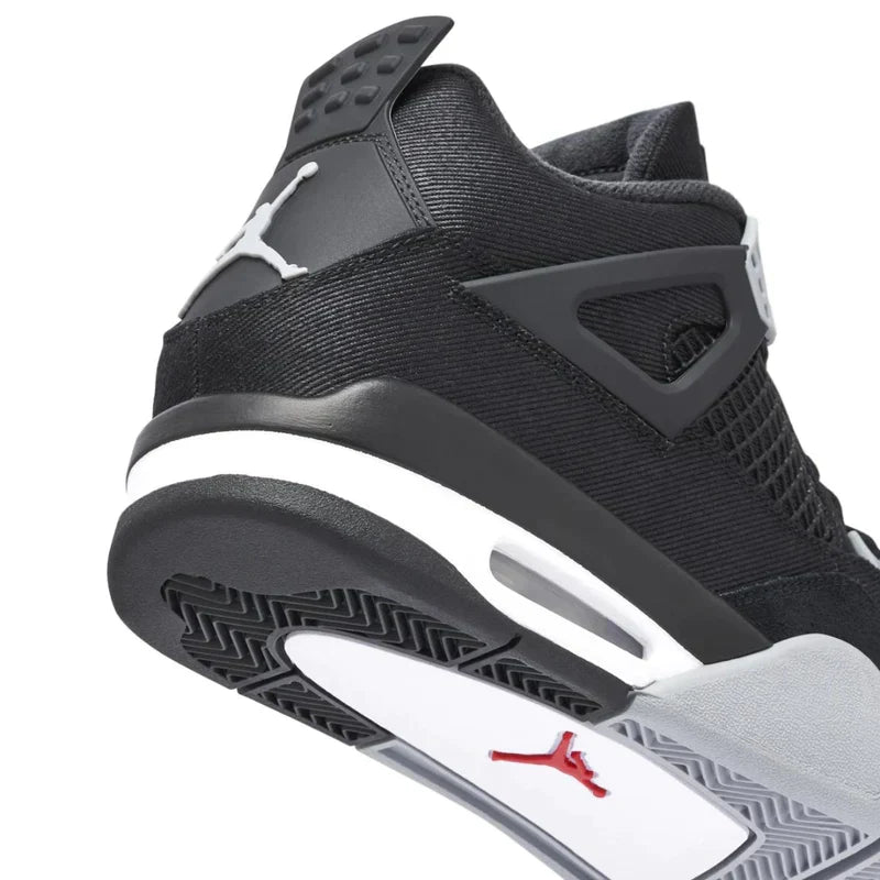 Air Jordan 4 Retro Trainers in Black Canvas